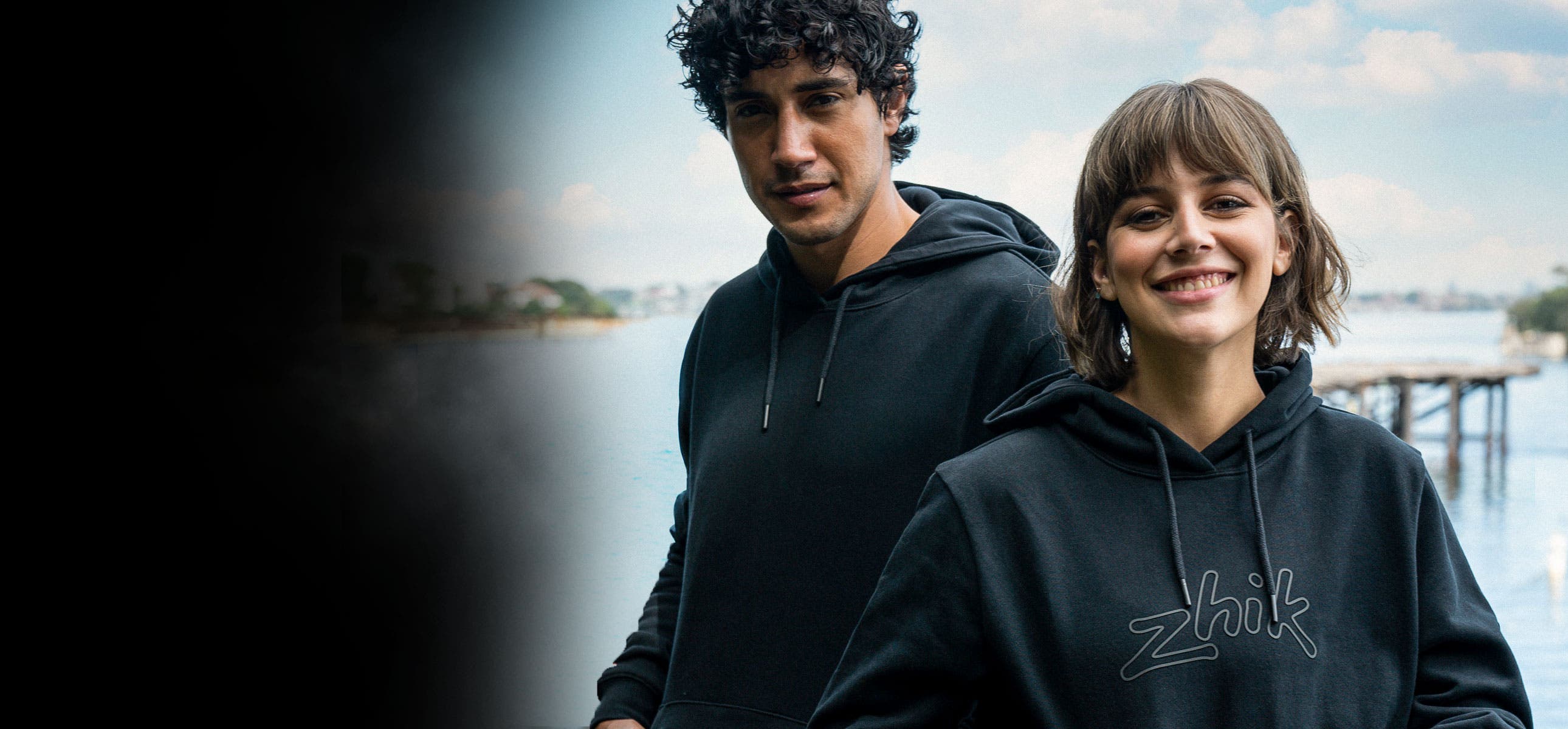 Man and Woman in Zhik hoodies