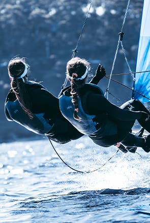 Men on Zhik branded sailboat