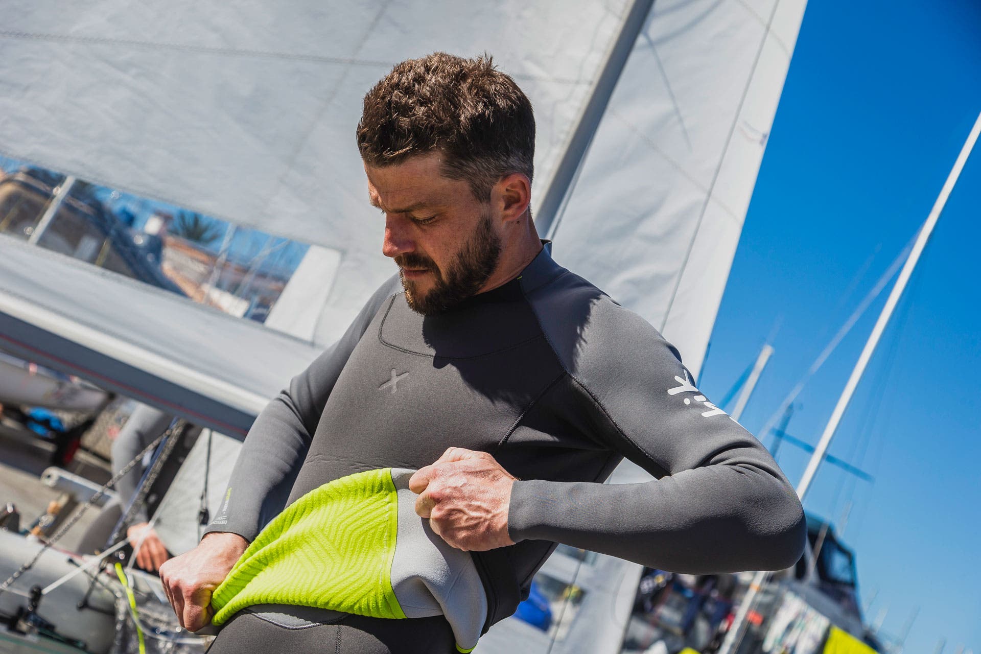 Man in Zhik wetsuit