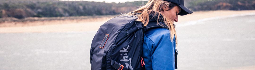 Woman with a Zhik waterproof bag